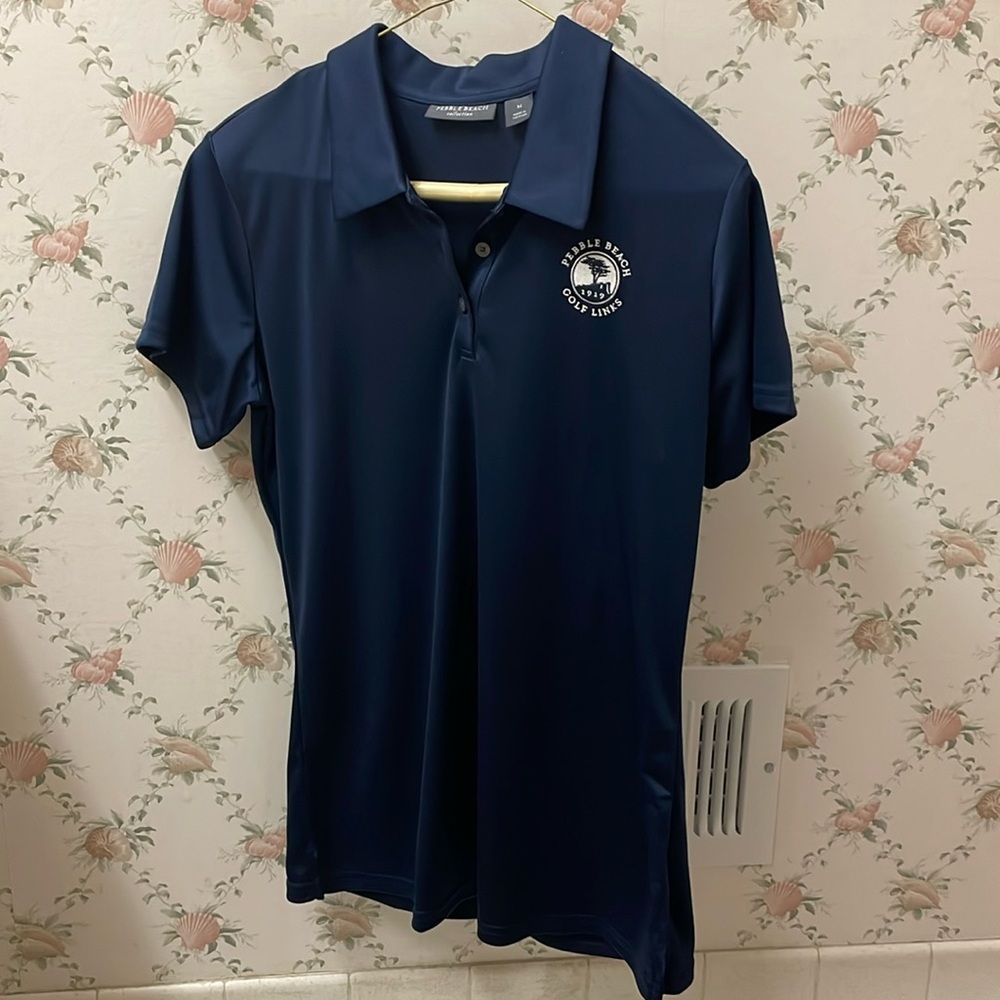 Never worn women’s polo shirt